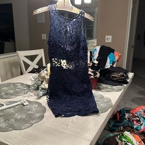 NWT Tashi rose brand sz medium runs smalll open back.  Boutique purchase